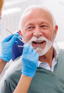 a patient receiving dental care from a dentist near Tyler